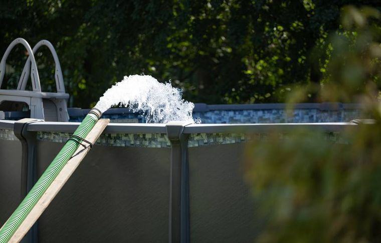 The dedicated clean-water tanker on a pool fill.