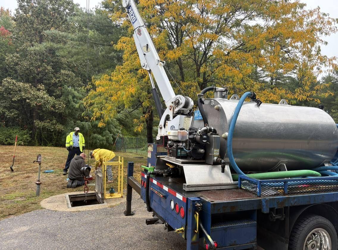 A commercial pump station being serviced at a business property.