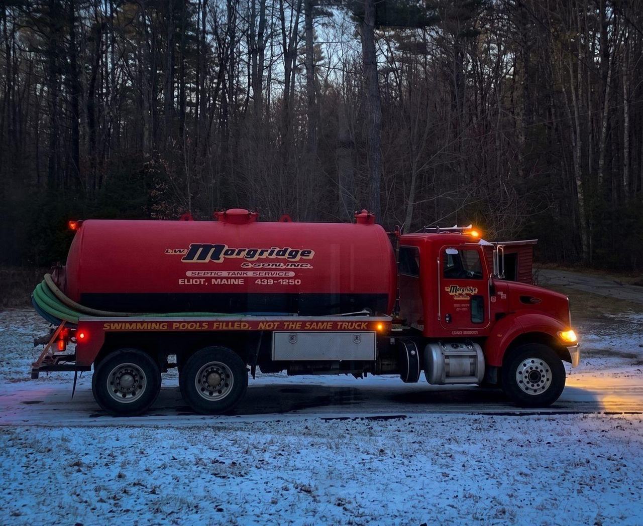 A Morgridge truck arriving on an after-hours call at dusk.