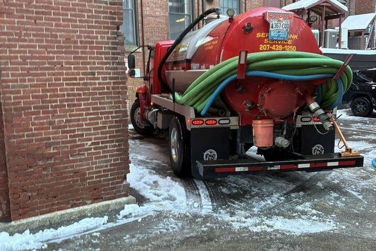 A Morgridge truck on an after-hours emergency call at dusk.