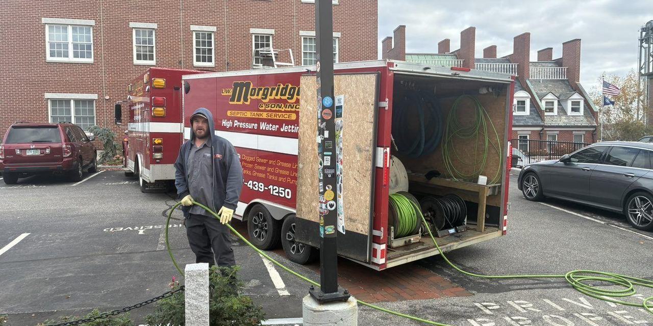 The hydro jetting rig set up on site with the hose reel run out to a line.