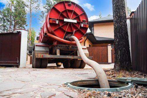 The hydro jetting rig with its hose reel, set up for a job.