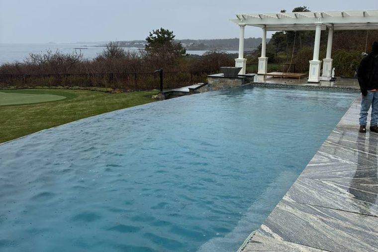 A filled backyard pool ready to swim in after the delivery.